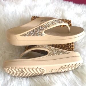 Crocs Women's Tan Glitter Flip Flops